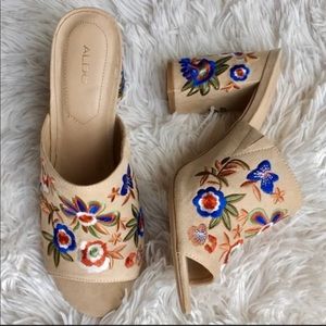 Also floral embroidered mules